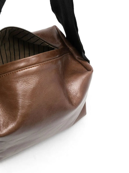 Uma Wangembossed-logo detail shoulder bag