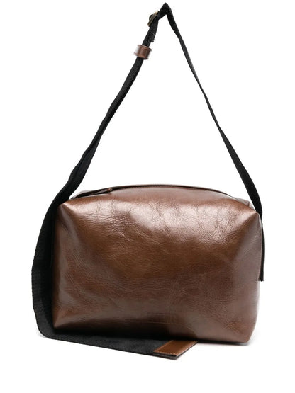 Uma Wangembossed-logo detail shoulder bag