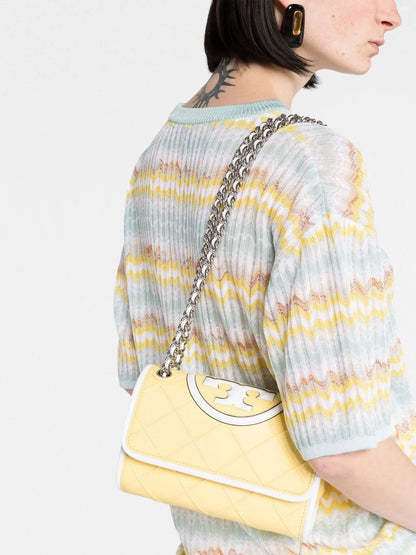 Tory Burchembossed and quilted cross-body bag