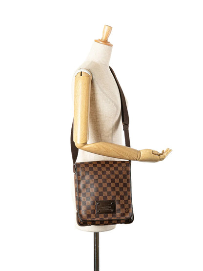 Pre-OwnedLouis Vuitton Pre-Owned2010 Damier Ebene Brooklyn PM crossbody bag
