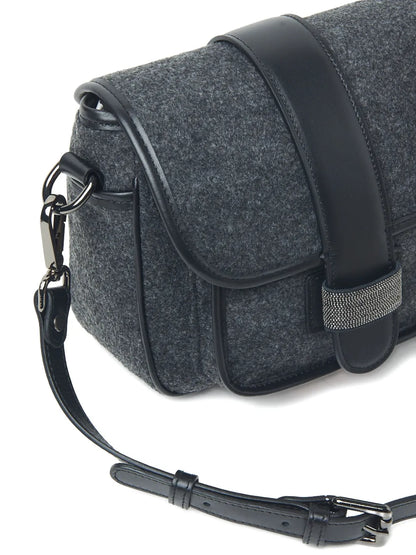 Pesericoleather-trimmed shoulder bag