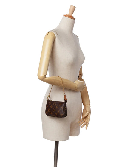 Pre-OwnedLouis Vuitton Pre-Owned2007 Monogram Mini Pochette Accessoires handbag