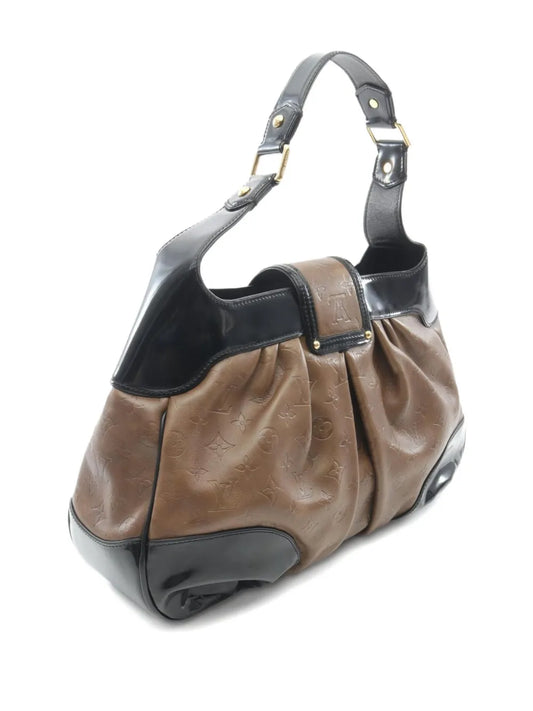 Pre-OwnedLouis Vuitton Pre-Ownedmedium 2006 Polly monogram debossed shoulder bag