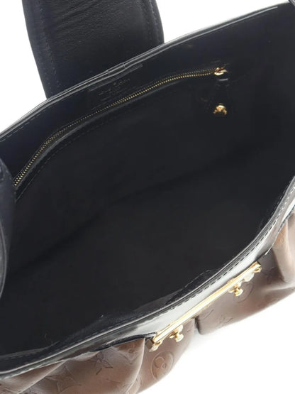 Pre-OwnedLouis Vuitton Pre-Ownedmedium 2006 Polly monogram debossed shoulder bag