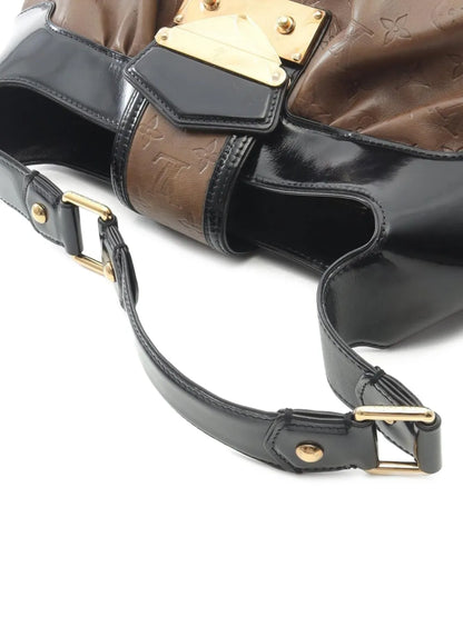 Pre-OwnedLouis Vuitton Pre-Ownedmedium 2006 Polly monogram debossed shoulder bag