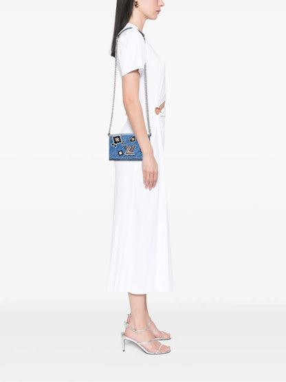 Pre-OwnedLouis Vuitton Pre-Owned2015 Epi Denim Twist Azteque Wallet on Chain crossbody bag
