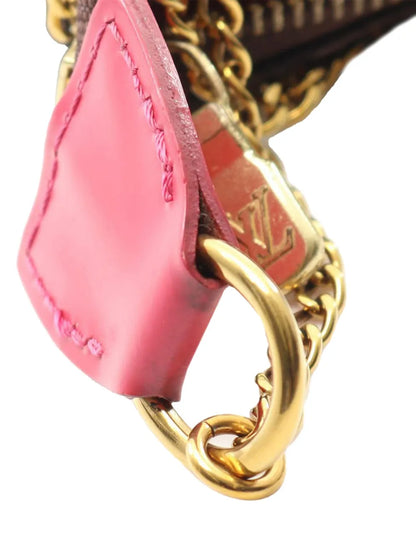 Pre-OwnedLouis Vuitton Pre-Owned2020 Monogram Vivienne Christmas Roller Coaster Mini Pochette Accessoires handbag