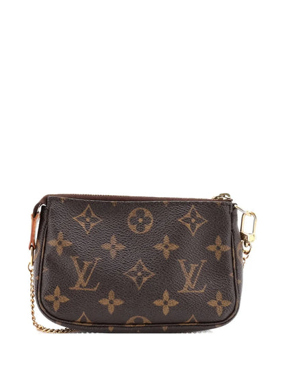 Pre-OwnedLouis Vuitton Pre-OwnedPochette Accessoires Monogram Canvas Mini clutch bag