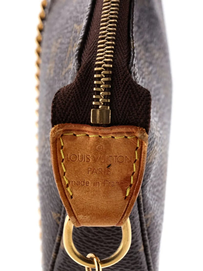 Pre-OwnedLouis Vuitton Pre-OwnedPochette Accessoires Monogram Canvas Mini clutch bag